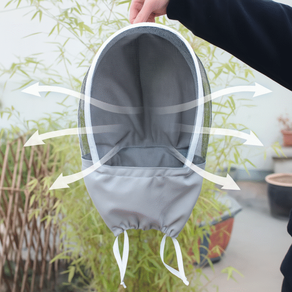 Ventilated beekeeping suit hood with breathable mesh fabric and airflow system, featuring adjustable drawstrings for secure fit and comfort